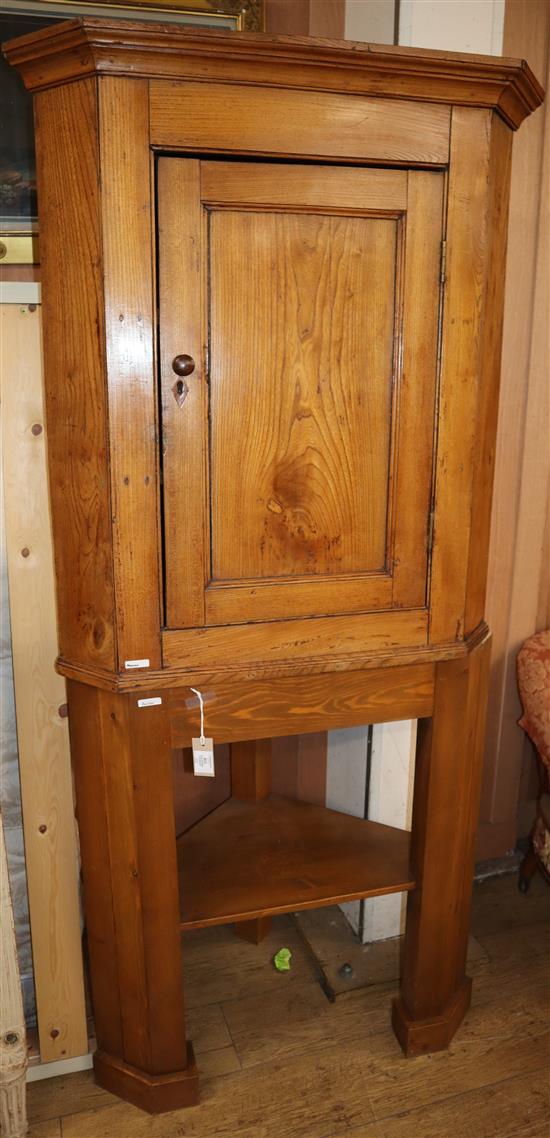 An elm corner cupboard H.188cm